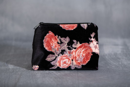 Pochette en velours rose à fleurs